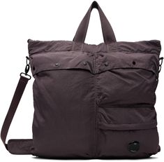 Water-resistant and piece-dyed nylon taffeta tote in purple. · Fixed carry handles · Adjustable and detachable crossbody strap · Acetate lens at face · Flap pockets, zip pocket, and patch pocket · Zip closure · Zip pocket at interior · Canvas lining · H18.5 x W19.5 x D0.75 Supplier color: Boulevard Purple Nylon Bags, Nylon Bag With Multiple Pockets For On-the-go, Purple Nylon Bags For Outdoor Use, Purple Nylon Bag For Outdoor Use, Purple Nylon Bag For Outdoor, Nylon Tote Shoulder Bag With Multiple Pockets, Nylon Shoulder Tote Bag With Multiple Pockets, Purple Nylon Bags With Zipper Pocket, Nylon Shoulder Bag With Double Handles And Pockets