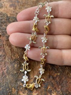 Sterling Silver Gold Plated 8MM Plumeria Flower / Turtle / Dolphin 2 Tone Hawaiian Bracelet - Etsy Canada Lei Making, Hawaiian Bracelets, خواتم خطوبة, Hawaiian Sea Turtle, I Get Money, Hawaiian Plumeria, Most Popular Flowers, Popular Flowers, Hawaiian Jewelry