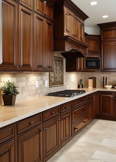 a large kitchen with wooden cabinets and marble counter tops on the island in front of an oven