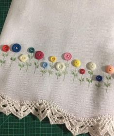 a close up of a piece of cloth with buttons on it