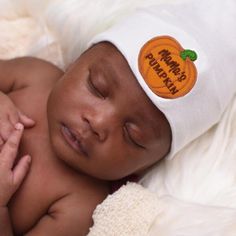 Fast Shipping! Handmade in USA. White Hospital hat for boys and girls - Gender Neutral. Orange Pumpkin with Mama's Pumpkin on the front. Three sizes - Newborn, 0-3 months, and 6-12 months available Playful White Beanie One Size Fits Most, Playful White Beanie One Size, Playful White Adjustable Beanie, White Personalized Cotton Hat, Personalized White Cotton Hat, Cute White Hat With Letter Print, Cute White Hats With Letter Print, Playful White Cap Beanie, White Adjustable Beanie For Babies