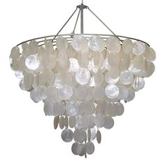 a chandelier made out of glass discs