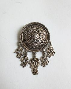 Gorgeous antique ottoman traditional brooch or turban pin made of gilded silver. It is marked 800. Measures 6.6x4.2cm (2.6x1.7 inch) and 3.9cm (1.5in) in diameter. Probably dates from theend of 1800's and it is in a very good condition. Items are shipped in the next 3 business days after receiving payment. We ship by Hellenic Post and after shipping we provide a tracking number. Shipping time depends on the destination and usually it takes approximately: To USA-CANADA 1-2 weeks To Europe 4-7 day Ornate Pendant Brooch For Ceremonial Occasions, Traditional Ceremonial Brooch Jewelry, Antique Ceremonial Brooches With Intricate Design, Antique Brooches With Intricate Design For Ceremonial Use, Ornate Filigree Brooches For Ceremonial Use, Ornate Brooches With Intricate Design For Ceremonial Use, Traditional Brooch With Intricate Design As Gift, Traditional Brooches With Intricate Design For Gifts, Traditional Brooches With Intricate Design As Gift