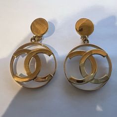 These Are So Hard To Find! I’ve Been Authenticating Chanel Jewelry For Over 20 Years And Don’t Come Across These Too Often. These Are A Bonus Because They Have Posts Welded Onto Them Already For Anyone That Prefer Pierced (Clips Still Intact Too). Perfect Holiday Gift For A Vintage Chanel Lover! Luxury Metal Clip-on Earrings, Gold Designer Metal Clip-on Earrings, Designer Gold Clip-on Round Earrings, Designer Gold Clip-on Earrings, Designer Small Hoop Gold Earrings, Designer Gold Drop Clip-on Earrings, Luxury Gold Clip-on Hoop Earrings, Designer Metal Drop Earrings, Designer Gold Round Earrings