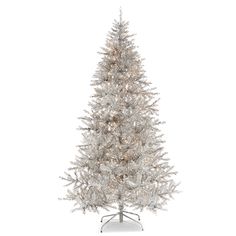 a white christmas tree with snow on the top and branches in silver tinsels