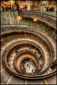 an overhead view of a spiral staircase in a building