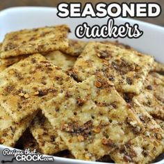 seasoned crackers in a white bowl with the words seasoned crackers above it