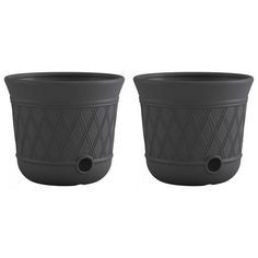 two black planters sitting next to each other