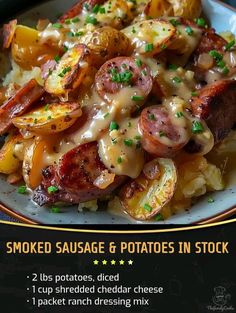 a plate with sausage and potatoes on it