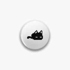 a black and white button with an image of a cat