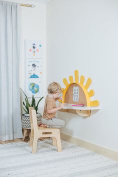 The Listing consists: ONE "SUN" Table + ONE Chair This wall-mounted table with cork board (or mirror) is a great idea for apartments and smaller shared rooms. Product features: ✔️ Developmental Needs: Children have different physical and cognitive requirements compared to adults. A table that is specifically designed for their size and needs can provide them with an appropriate work surface and seating height, which promotes proper posture and comfort during various activities. ✔️ Conforms to th Toddler Desk, Montessori Table, Boho Style Nursery, Baby Mirror, Wall Mounted Table, Yellow Mirrors, Montessori Furniture, Toddler Playroom, Activity Table