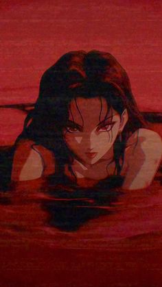 a woman is floating in the water with her head above the water's surface