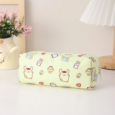 Get organized in style with the Sanrio Color Pop Pencil Case - the perfect blend of spaciousness and cuteness! It features adorable character illustrations on the outside. With one zipper and a convenient pocket, it's easy to carry all your stationery essentials wherever you go. It is crafted from easy-to-maintain material. Choose from our selection of six beloved Sanrio characters to add a touch of personality to your daily routine. Size: 19 cm x 5 cm x 6 cm Material: canvas Brand: Sanrio Binder Paper, Kawaii Pens, Stationery Essentials, Pen Shop, Watercolor Greeting Cards, Pastel Colour Palette, Whimsical Illustration, Backpack Tote Bag, Pen Refills