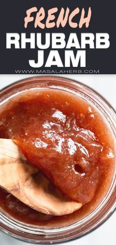 a jar filled with homemade rhubarb jam and a wooden spoon