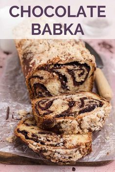 chocolate babka is cut into slices on a plate