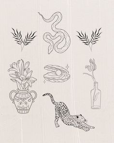 an image of some flowers and plants in vases on a tablecloth with the words snake