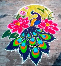 a painted peacock on the ground with flowers