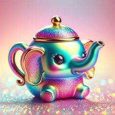 an elephant teapot with a lid on it