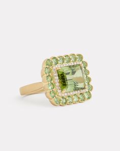 Tsavorite and Diamond Edged Green Tourmaline Ring – Jamie Wolf Green Multi-stone 14k Gold Diamond Ring, Green Multi-stone Diamond Ring In 14k Gold, Multi-stone Green Diamond Ring In 14k Gold, Luxury Multi-stone Peridot Ring, Luxury Peridot Multi-stone Rings, Luxury Tsavorite Ring With Gemstone Accents, Luxury Tsavorite Rings With Halo Setting, Luxury Green Sapphire Ring With Accent Stones, Fine Jewelry 14k Gold Green Sapphire Ring