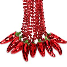 several red chili peppers hanging from a string