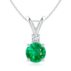 This four-prong set emerald pendant displays the perfect blend of style and beauty. A radiant diamond on top of the lush green gemstone enhances its charm. This classic solitaire emerald pendant with a polished v-bale is artfully designed in silver. Emerald Pendant, Radiant Diamond, Solitaire Pendant, Green Gemstones, Lush Green, Prong Setting, Turquoise Necklace, Lush, Platinum