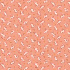 an orange background with white rabbits on it