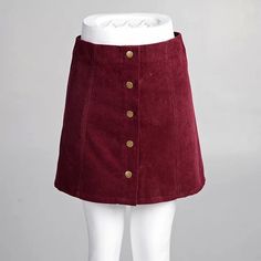 A fashion skirt crafted from corduroy, button fastenings through front. This A-line mini skirt further the retro feel by tucking in a turtleneck sweater. Material:CorduroyColors: Black,Navy,Orange,Wine redSize: XS,S,M,LWaistline: HighDesign: A-LinePattern: Pure ColorFit Type: BodyconClose Type: ButtonOccasion: CausalThe accessories are not included. Chic Winter Mini Skirt With Button Closure, Chic Winter Mini Skirt With Buttons, Trendy Buttoned Mini Skirt For Fall, Trendy Buttoned Mini Skirt For Winter, Casual Corduroy Mini Skirt For Winter, Winter Corduroy Skirt With Button Closure, Mini Skirt With Button Closure For Fall, Fall Mini Skirt With Button Closure, Trendy Corduroy Mini Skirt For Winter