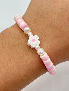 Clay Bead Bracelet Ideas Pink And White, Cute Pink Beaded Bracelets, Clay Bead Bracelet Ideas Flower Charm, Things You Need To Start A Bracelet Business, Coquette Clay Bead Bracelet Ideas, Summer Bracelet Inspo Clay Beads, Pink Clay Bracelet Ideas, Coquette Clay Bead Bracelets, Phone Charm Ideas Clay Beads