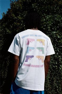 Become part of the 'Super Soaker Club' with our latest drop Graphic print on the front and back Woven label details at bottom of t-shirt and inside the collar Relaxed fit, 100% soft cotton Unisex t-shirt Models are wearing a size L We use industry standard garments so recommend ordering the size you would normally wear. If you are between sizes then size up For women we recommend ordering the following sizes for a fitted shape: 6/8- small, 10- medium, 12- large, 14- x-large. If you would like an oversized fit we recommend ordering one or two sizes up depending on how oversized you'd like your t-shirt to be. Free stickers included in every order We have a 30 day no hassle return policy FREE delivery on all UK orders over £75 and international orders over £100 We accept Paypal and all major Super Soaker, Be Free, White Short, Free Stickers, Graphic Prints, White Shorts, Graphic Tees, Relaxed Fit, Streetwear Brands