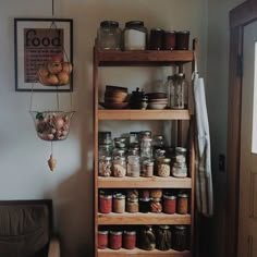 a wooden shelf filled with lots of food