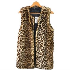 Inc - Wild Faux Fur Cheetah Vest - S/M 4 Hook Front Closure. Polyester Blend. See Photos For Details. Approximate Measurements- Underarm To Underarm: 19.5” Length, Shoulder Down: 30.5” Wolf Fur Vest, Black Knitted Vest, Animal Print Vests, Black Fur Vest, Suede Fringe Vest, Dark Blue Suit, Brown Faux Fur Vest, Faux Suede Vest, Womens Faux Fur Coat