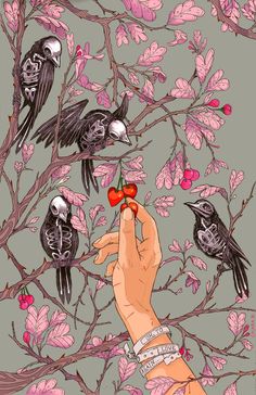 a hand holding a heart shaped object in front of a tree filled with birds