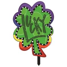 a lucky shamrock shaped sign with the word luck written on it's center piece