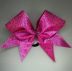 Hot pink bow and stones mystique bow. very sharp and super pretty under lights,  also available with many other colors of stones and ribbon.  msg for team discount info. Cheer Bows, White Glitter, Pink Bow, Other Colors, Hot Pink, Etsy Gift Card, Stone, Pink, Color