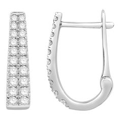 Hoop earrings are a must have for any woman’s wardrobe. These finely detailed one carat total weight round brilliant cut diamond earrings are fashioned from 14k white gold and will become a daily favorite! Formal Small Hoop Diamond Earrings With Prong Setting, Classic Hoop Diamond Earrings For Formal Occasions, Formal Small Hoop Diamond Earrings With Halo Design, Classic Diamond Hoop Earrings With Halo Design, Classic Hoop Earrings With Brilliant Cut, Classic Small Hoop Diamond Earrings With Halo Design, Classic Small Hoop Brilliant Cut Diamond Earrings, Classic Small Hoop Diamond Earrings With Prong Setting, Formal Small Hoop Diamond Earrings Channel Set