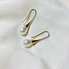 😊Join us today and take an additional 15% Off!    http://eepurl.com/hfCx7b 💫These sophisticated gold plated pearl earrings are very delightful! 👀 We have tons of similar style Earrings in the shop! https://www.etsy.com/listing/913298121/cubic-zirconia-dangle-earrings-cz-flower?ref=shop_home_active_12&pro=1 ✨The Earring posts are made of 925 Silver ✨ ❤ It is an allergy-free post for most people who are allergic to nickel.  (925 Silver Post is a jewelry alloy of 92.5 percent silver and 7.5 percent other metals. So it's not an allergy-free for those who have highly sensitive skin.) ❤ just keep in mind that silver post is very soft and will naturally turn black over time. Please use the silver clean products to clean your Jewelry and simply Straightening the Bent Earring Posts.  🎁 Free gif Minimalist Nickel-free Pearl Earrings For Formal Occasions, Minimalist Hypoallergenic Pearl Earrings For Formal Events, Elegant Teardrop Earrings With French Hook For Gift, Elegant Gift Teardrop Earrings With French Hook, Pearl Earrings With French Hook For Gift, Classic Single Teardrop Earring As Gift, Minimalist White Earrings With French Hook, Classic French Hook Earrings As Gift, Classic French Hook Earrings For Gifts