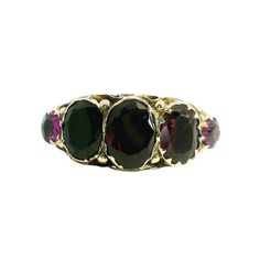 Such an eye-catching and detailed Victorian setting!  Beautiful and rich looking with three oval red garnet gems, flanked by two round lovely amethyst stones, which create a beautiful contrast of color. This ring would make a gorgeous birthday, anniversary, or holiday gift for your loved one.   Antique Ring - Antique Victorian 9k Rose Gold Garnet & Amethyst Ring Victorian 9k Rose Gold Faceted Garnet, Amethyst Ring Size 7.75   Ring measures approximately 6mm at center, back of band is 1mm wide.  Please read our shop policies prior to purchase. Thanks for looking and contact us with any questions. Gorgeous Birthday, Garnet Gem, Red Garnet, Amethyst Stone, Amethyst Ring, Antique Rings, Rings Statement, Garnet, Statement Rings