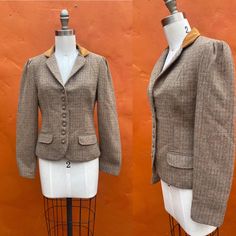 "Vintage Women's 1970s blazer Gold, Brown, Teal  Lined pockets buttons Velvet collar puffed sleeves EUC Bust: 34\" Waist: 28\" Shoulder to hem front: 21\" Shoulder to sleeve hem: 22\"" Fitted Button-up Tweed Jacket With Pockets, Fitted Button-up Tweed Jacket For Business Casual, Fitted Single Breasted Tweed Jacket, Fitted Single-breasted Tweed Jacket, Fitted Tweed Blazer With Buttons, Retro Fall Office Blazer, Vintage Button-up Tweed Jacket For Fall, Fitted Houndstooth Tweed Jacket With Lapel Collar, Vintage Tweed Outerwear For Office