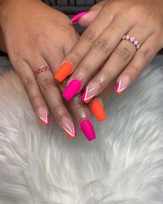 No matter if you have long coffin nails, almond nails or natural short nails, in this article you will find lots of pretty manicure ideas of summer orange nails that work for any nail shape and nail length Orange And White Nails Ideas, Hot Summer Nails Almond, Pink Orange Acrylic Nails, Orange And Pink Nails Ideas, Nail Pink And Orange, Summer Acrylic Nails Orange And Pink, Orange And Fuschia Nails, Orange Nail Designs Almond, Pink Orange And White Nails