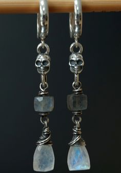 Skull Moonstone Labradorite Oxidized Sterling Silver Earrings Dimensions Total length: 2.2 Inches (56 Millimeters) Earrings Earwire Size: 16mm  Moonstone Beads Size: about 8x12 mm Labradorite Beads Size: about 5 mm All metal components are Sterling Silver  *Arrives in a gift box* I gladly accept returns Contact me within: 3 days of delivery Ship items back within: 7 days of delivery No returns will be accepted after 14 days. Buyers are responsible for return shipping costs. The refund will be se Gothic Skull Jewelry With Ear Wire, Gothic Skull Pierced Jewelry, Moonstone Beads, Labradorite Beads, Sterling Silver Earrings, Labradorite, Moonstone, Silver Earrings, Dangle Drop Earrings