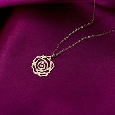 Embrace the timeless beauty of our 14K Solid Gold Adjustable Rose Flower Necklace for Women. This exquisite necklace features a delicate rose flower pendant crafted from solid 14K gold. The adjustable chain allows for a perfect fit, ensuring both comfort and style. The rose symbolizes love, beauty, and femininity, making it a meaningful and elegant accessory. Whether worn for everyday elegance or to add a touch of romance to special occasions, this necklace is a stunning choice. Capture the esse Gold Rose Pendant, Rose Gold Flower Pendant Necklace In Fine Jewelry Style, Feminine Rose Gold Flower Shaped Jewelry, Feminine Rose Gold Flower-shaped Jewelry, Rose Gold Flower Pendant Necklace With Delicate Chain, Fine Jewelry Rose Gold Necklace With Flower Charm, Rose Gold Fine Jewelry Necklace With Flower Shape, Dainty Rose-colored Flower-shaped Jewelry, Delicate Rose Flower Shaped Jewelry