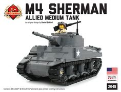 a lego army tank with a person sitting on top of it's turrets