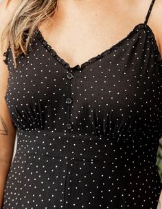 Get ready to turn heads in the Trinity Dress. Made from lightweight rayon gauze, this midi slip dress features a playful mini dot pattern and feminine ruffle detailing. Perfect for a night out or a summer day, this dress has got you covered. (You'll be the envy of everyone's eye!) 100% Rayon The Trinity, Midi Slip Dress, Romper Dress, Skirt Leggings, Dots Pattern, Summer Day, Dress Romper, Cardigan Jacket, Short Tops