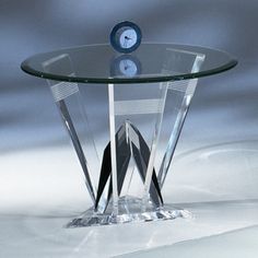 a glass table with a clock on top