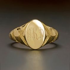 Featured here is an absolutely immaculate vintage inspired signet ring that is hand engraved with a contemporary take on Florentine engraving!Originating from the Latin word “signum” meaning “sign”, signet rings originated amongst the ruling classes and were historically marked with a unique family crest. These rings were used to mark and seal documents by pressing the face into hot wax. Signet rings were not only used as official signatures, but were so personal and specific to the individual t Oval Shape Face, Shape Face, Latin Word, Signet Rings, Latin Words, Gold Signet Ring, Family Crest, Hand Engraving, Signet Ring