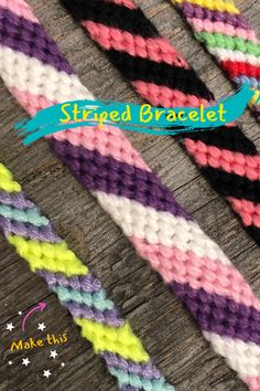 two braided bracelets sitting next to each other on top of a wooden table