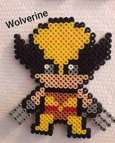 the beaded brooch has been made to look like wolverine