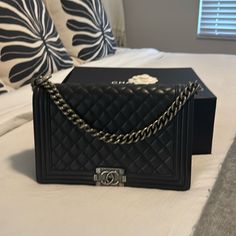 I Purchased This New From Chanel It Was A Gift To Me So I Don’t Have The Paperwork But I Have The Authentic Box Which Are Hard To Come By Anymore With The Flower Too. It’s Just Way Too Big For Me I Am 5’1’’ And This Is The Larger Size. The Inside Has A Little Bit Of Wear From My Makeup Or Just Daily Use But It’s The Most Incredible Bag I Wish I Could Look Cute Wearing It It’s Just Too Big On My Body. Black Baby, Black Babies, Chanel Boy, Chanel Boy Bag, Large Size, Chanel, Bag Lady, The Incredibles