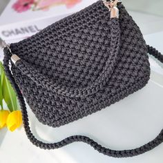 👜GENERAL FEATURES👜  FeyZolfey black crochet bag is produced from 100% polypropylene yarn. The overall dimensions of this women's shoulder bag are 20x18x8cm. The lining inside this black handbag is satin material and has one inner pocket. This quilted bag also offers sophisticated styling. This top handle purse has one knitted (85cm) shoulder strap and one crocheted short handle to allow you to wear it as a classic handbag. It also has a zipper closure system. These handmade luxury bags do not contain chemicals that may affect human health. ⭐A UNIQUE PIECE⭐  FeyZolfey knitted bag for ladies has a magnificent look thanks to its unique design. Summer bags for women, which have multiple uses, can be used daily, on the beach, at an invitation, or in areas such as school. Due to the perfect si Luxury Handwoven Black Shoulder Bag, Luxury Handwoven Black Bags, Luxury Summer Crochet Top Handle Bag, Luxury Black Top Handle Crochet Bag, Luxury Black Crochet Bag For Summer, Luxury Black Handwoven Crochet Bag, Luxury Black Crochet Shoulder Bag, Luxury Black Handwoven Shoulder Bag, Black Crochet Bag