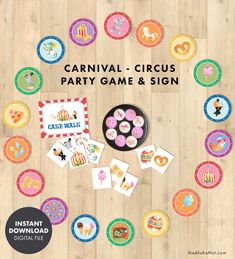 carnival circus party game and sign on wooden floor with cupcakes, donuts, candy